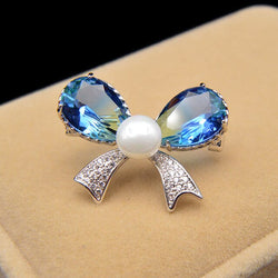 Cubic Zirconia Bow Pearl Accent Brooch
